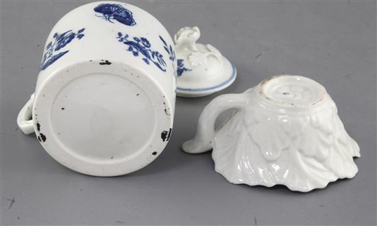 A Worcester Mansfield pattern butter boat, c.1760 and a Worcester floral pattern mustard pot and cover, c.1770, 9cm and 9.5cm